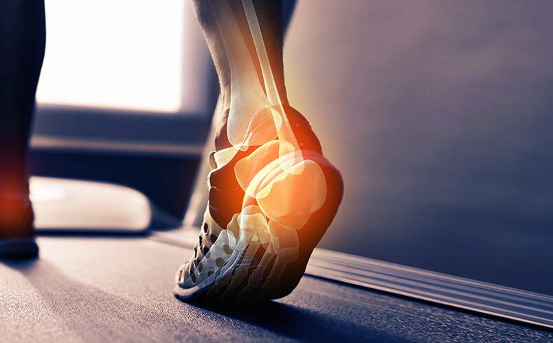 A person with their foot on the ground
